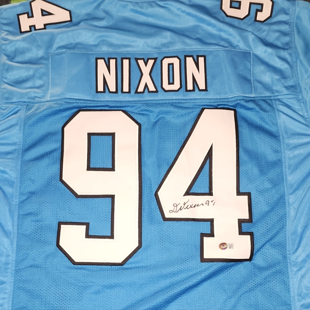 DAVIYON NIXON AUTOGRAPHED #94 BLUE CAROLINA PANTHERS L JERSEY BECKETT